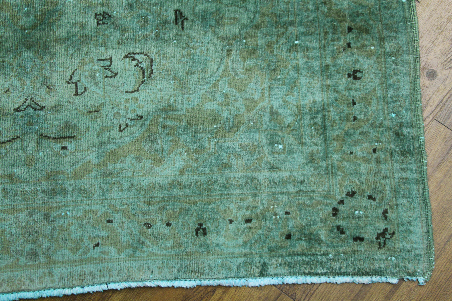 distressed teal rug